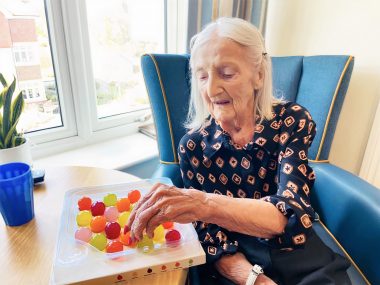 jelly drops dementia | Alzheimer's News Today | photo of a person with dementia reaching for a jelly drop